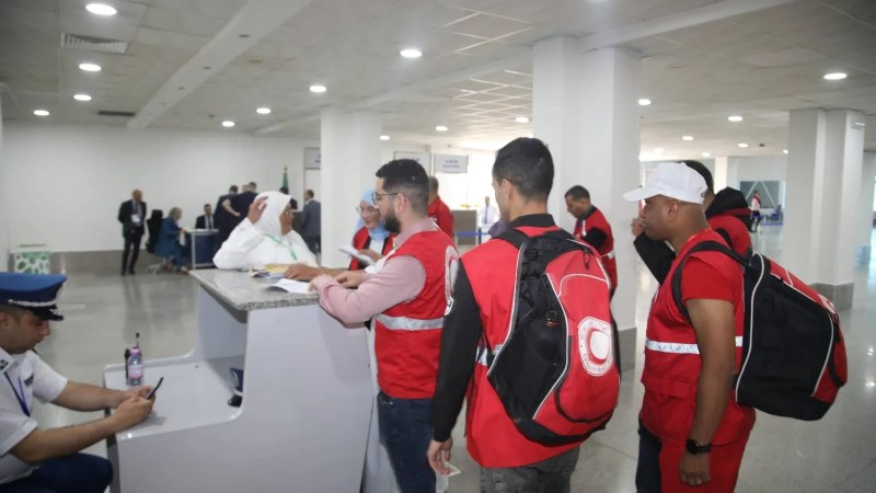 Algerian Red Crescent Volunteers Accompany, Assist First Hajj Pilgrims Departing from Algiers