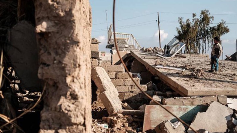 انتشال 61 جثة من تحت أنقاض مبنى في الموصل