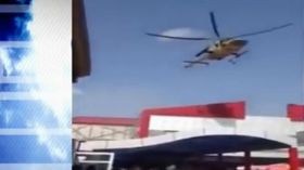 طيار عراقي يحلق بمروحية فوق جامعة في بغداد لتحية حبيبته!