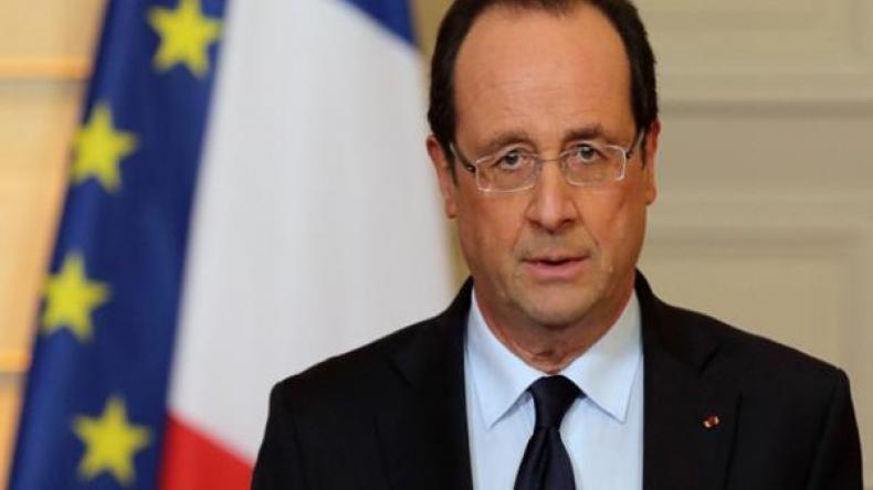هولاند يشدّد على عدم قبول فرنسا لمخيمات اللاجئين على أراضيها