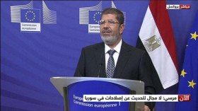 مرسي: “مصممون” على رحيل الأسد