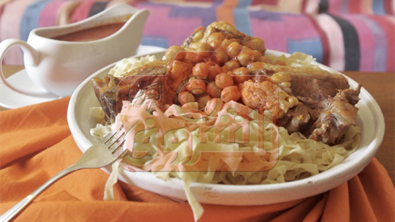 رشتة عريضة بمرق أحمر