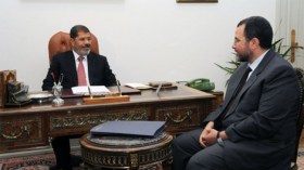 قنديل يكشف عن طاقمه الحكومي واحتفاظ وزيري الخارجية والمالية بمنصبيهما