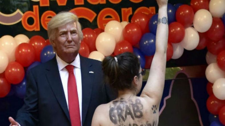 ناشطة عارية تهاجم “ترامب” في مدريد!