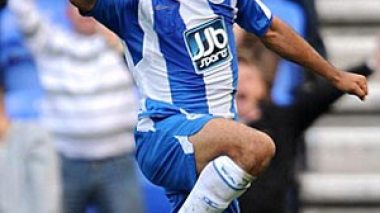 Wigan striker Zaki denies talk of bust-up with boss Bruce