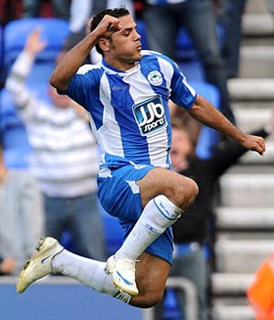 Wigan striker Zaki denies talk of bust-up with boss Bruce