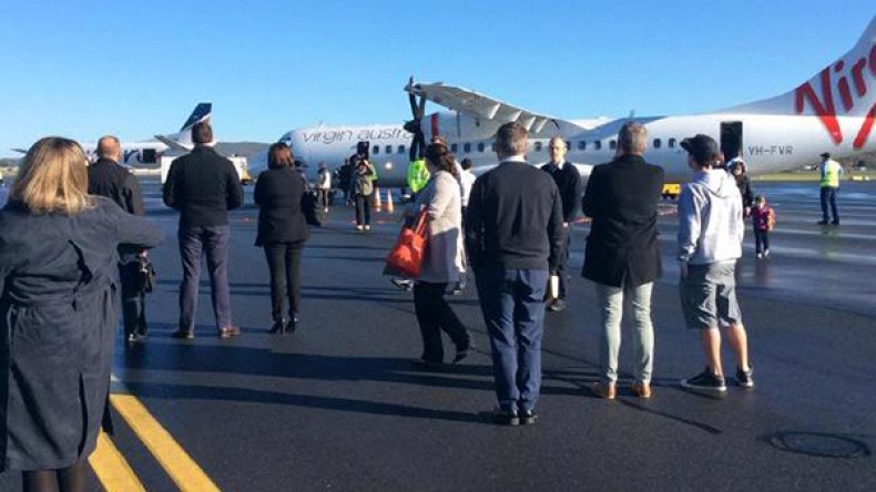 ركاب يقفزون من طائرة في أستراليا بعد تهديد كاذب