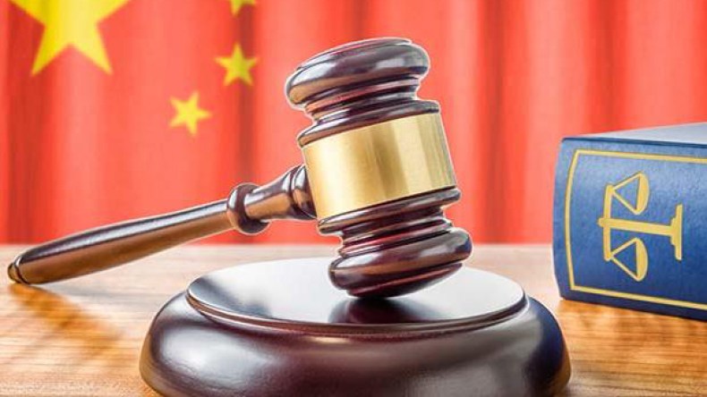 السجن المؤبد لمسؤول صيني بتهمة الفساد