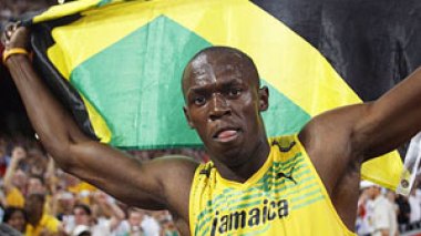 Olympics: Bolt saunters into history in 9.69 sec
