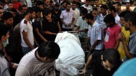 ارتفاع عدد شهداء العدوان الإسرائيلي على غزة إلى 718
