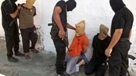الجرائم التي ارتكبها العملاء الذين أعدموا في غزة