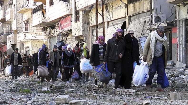 مقاتلو المعارضة السورية يغادرون آخر حي يسيطرون عليه في حمص