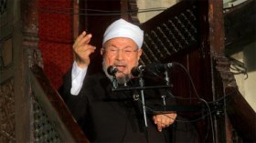 القرضاوي: المطالبة برحيل الرئيس محمد مرسي حرام