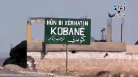 معارك عند معبر كوباني مع تركيا بين الأكراد وداعش