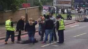 كاميرون يقطع زيارته لفرنسا بعد ذبح جندي في لندن