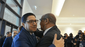 عناق بين مساهل وبوريطة