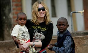 Madonna adoption blow after man claims to be girl's father