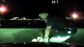 شرطي أمريكي يواجه قطاراً سريعاً لإنقاذ امرأة