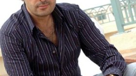 Virgin Mega Stores present Ragheb Alameh with a platinum record