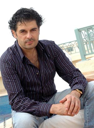 Virgin Mega Stores present Ragheb Alameh with a platinum record