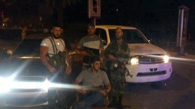 مظاهرات علوية في اللاذقية تطالب بإعدام ابن عم بشار الأسد