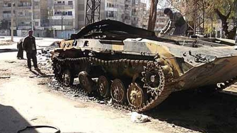 Activists: Syrian Forces Kill at Least 12 in Homs