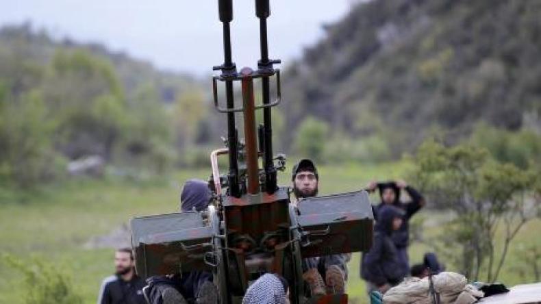 ستون جثة من قوات النظام السوري في شوارع جسر الشغور