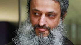 شبيه “بن لادن” يُطرد من عمله في الشرطة البريطانية