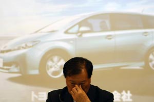 Toyota reports further losses