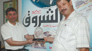Previous Guantanamoâ€™s detainee offers a poster to Echourouk