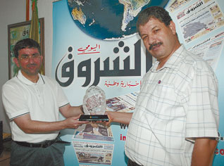 Previous Guantanamoâ€™s detainee offers a poster to Echourouk