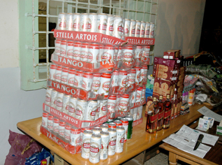 Liquor importers pressure to sell alcohol in super markets .