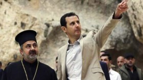 الأسد يقوم بزيارة نادرة لكنيسة قرب جبهة للقتال في دمشق