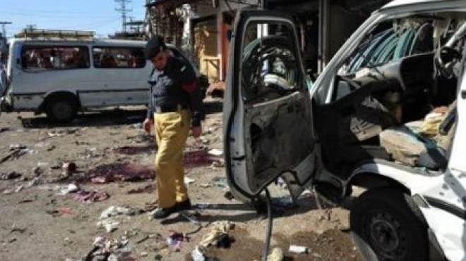 Bomb blasts kill 13 at Baghdad market