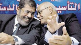 العوا للمحكمة: مرسي هو الرئيس الشرعي للبلاد