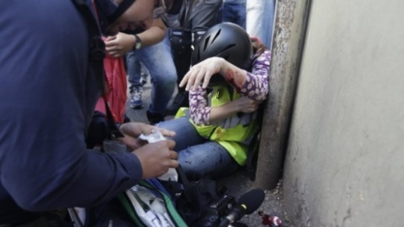 إصابة إعلاميتين في مظاهرات احتجاجية ضد المونديال بالبرازيل