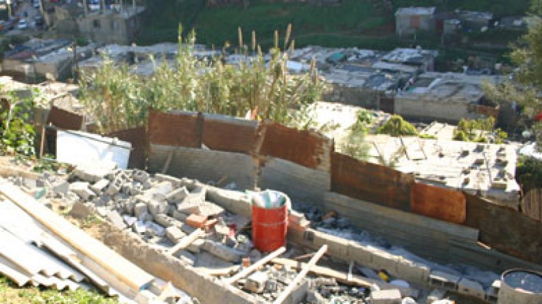 وزارة السكن:260ألف عائلة غادرت البيوت القصديرية خلال18شهرا