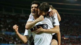 Ballack cracker sends Germany through