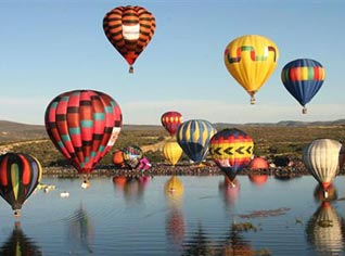 Winds drive European air balloons carrying seven athletes to the Algerian coasts