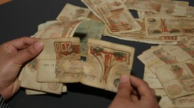 شجارات واكتظاظ بمراكز البريد بسبب ورقة 200 دينار