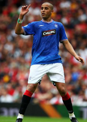 'Missing' Madjid Bougherra is in the clear after delayed return to Rangers