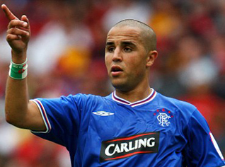Rangers star Madjid Bougherra insists he is happy to stay put for rest of the season