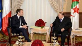 بوتفليقة يتحادث مع ماكرون