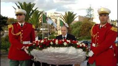 President Bouteflika stands in silent remembrance of Revolution martyrs