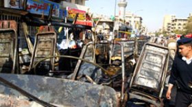 مقتل 12  عراقيا في انفجار سيارتين ملغومتين ببغداد