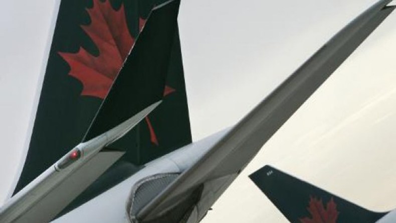 كندية تنجب طفلة في طائرة فوق المحيط الهادئ