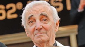 أزنفور يلقي كلمته باللغة العربية والحجاب ينافس فساتين جيفانشي  في مهرجان كان