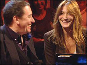 Carla Bruni wakes Nicolas Sarkozy up with her songs