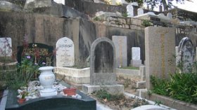 The burial of a Christian in an Islamic cemetery sparks controversy among population