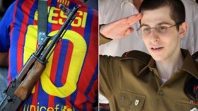 جزائريو إسبانيا استقبلوا شاليط” بأعلام فلسطين والجزائر